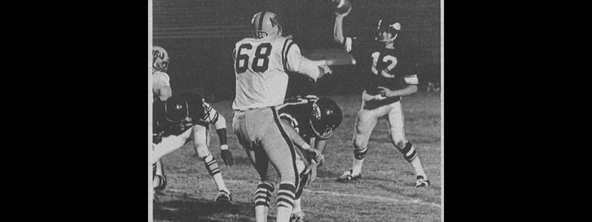 Football play (Bruce Vlink) throwing football in 1969