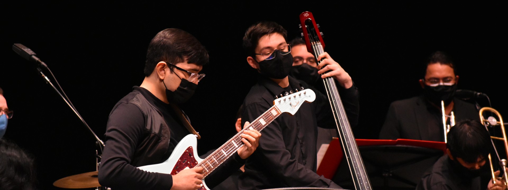 Three students playing in Jazz Big Band