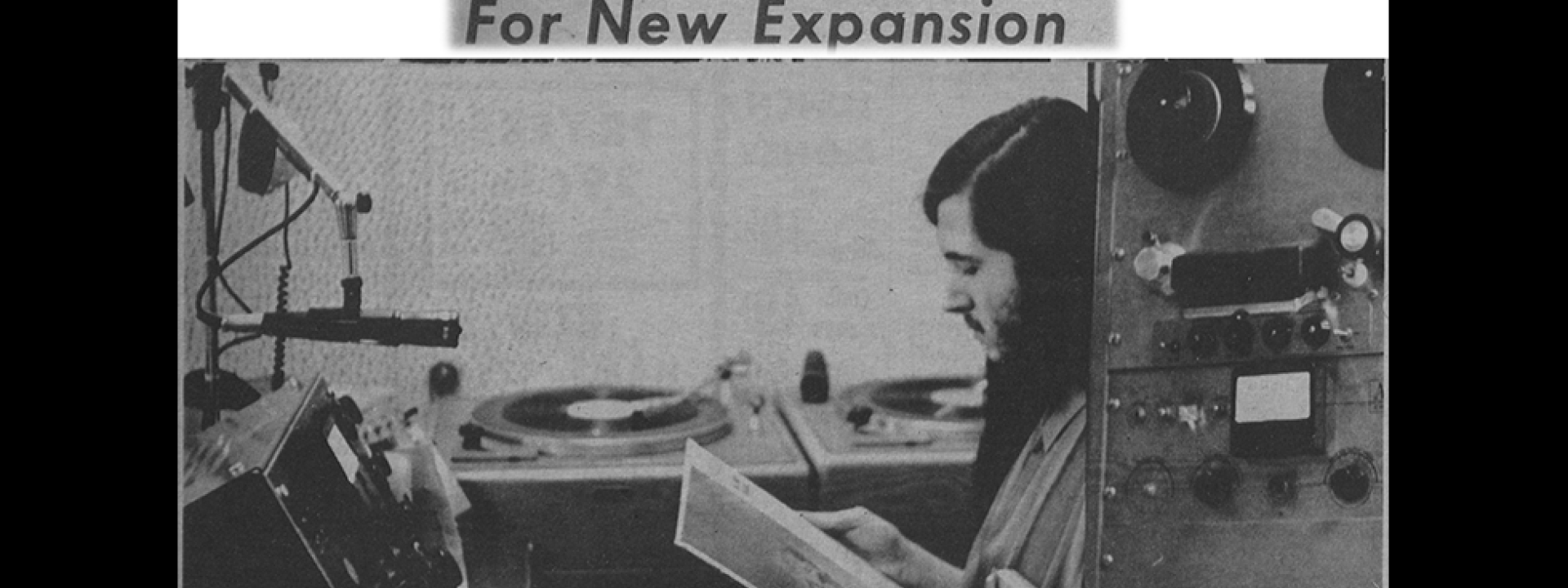Newspaper clipping with man in radio station. Text: Radio Station Plans for Expansion