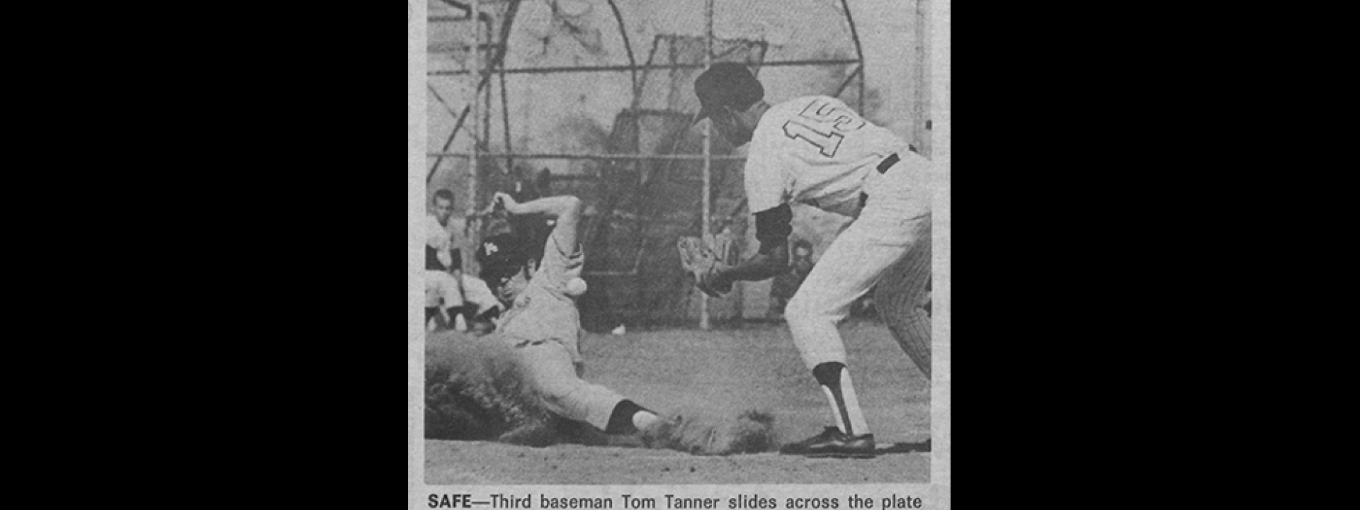 Cal State LA baseball player Tom Tanner slides on base