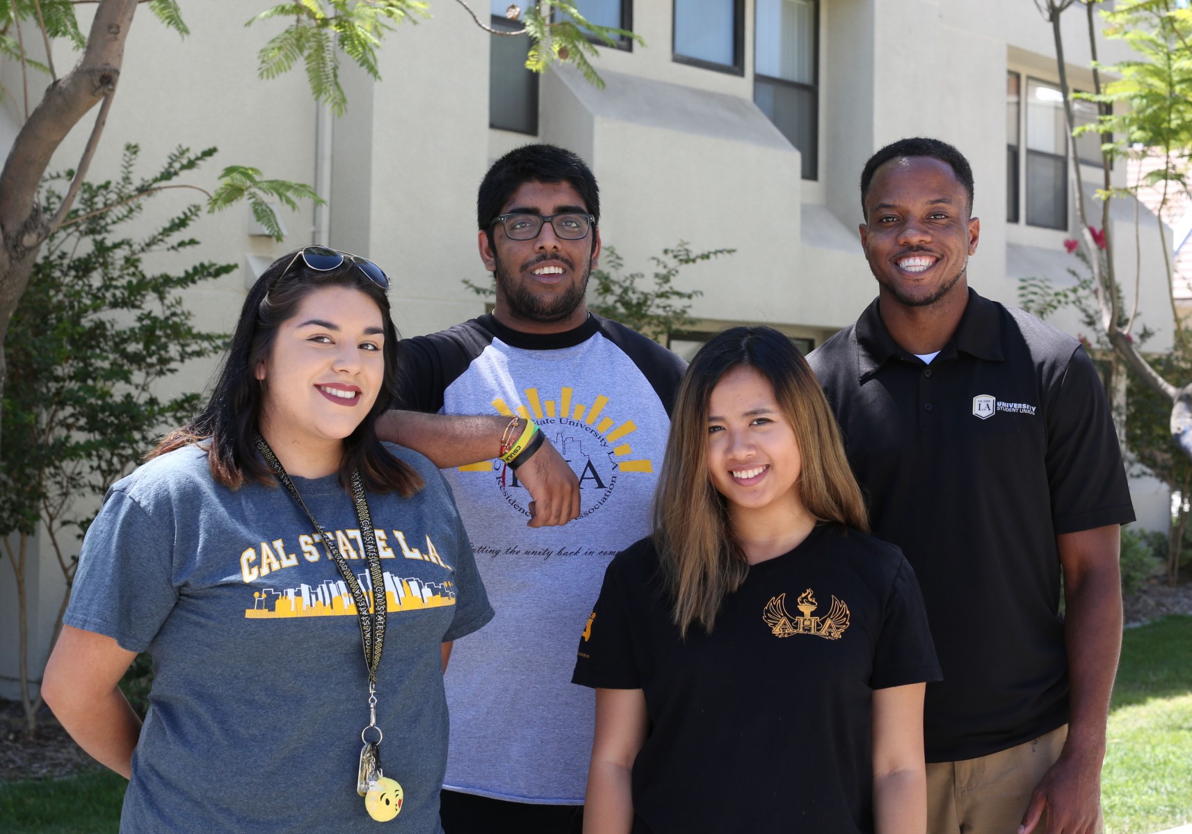 Students and staff smiling.