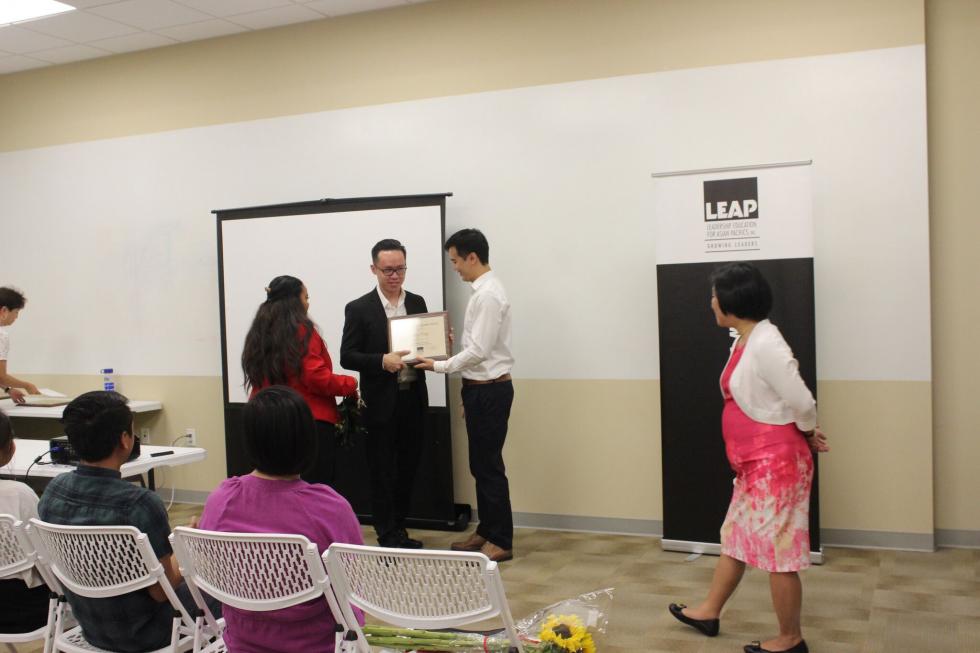 Tony Tang awarded a certificate at LEAP