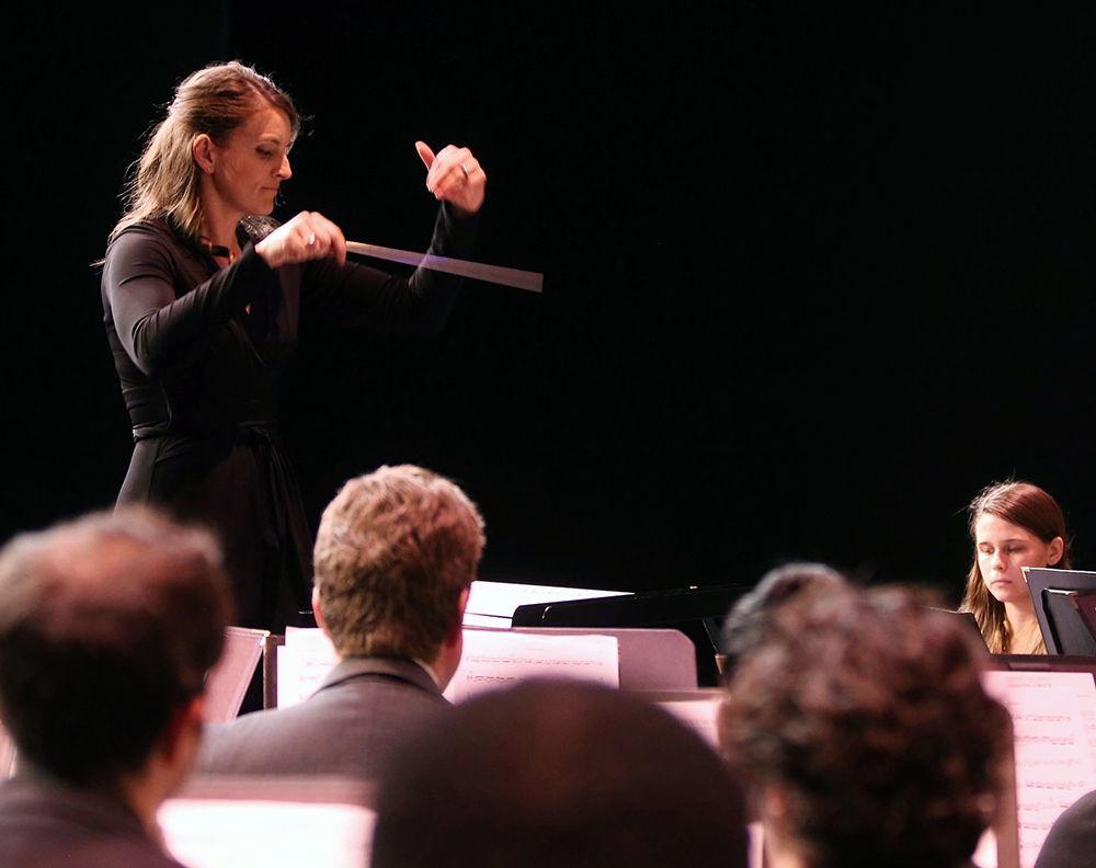 Emily Moss conducting